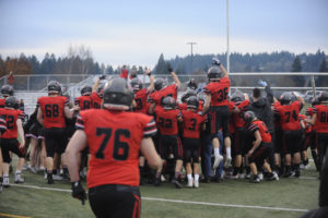 The Camas High School football team celebrates after beating Eastmont High School 41-0 on Nov. 16. This week the Papermakers (11-0) have their steely-eyed focus on the Vikings (10-1), who beat Eastlake High School 40-34 on Nov. 15 in a state tournament first-round game. (Wayne Havrelly/Post-Record)