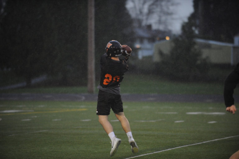 Washougal High School senior Brevan Bea pulls down a catch during a driving rainstorm at a Nov. 18 practice session.  &quot;It was a crazy game, a little scary at points,&quot; Bea said about the Panthers&#039; come-from-behind victory over Clarkston High School on Nov. 16.