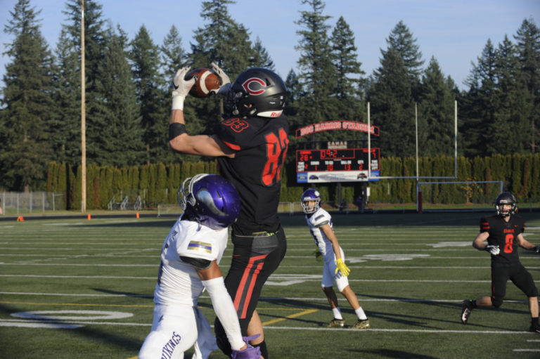 Photos by Wayne Havrelly/Post-Record 
 Camas senior Jackson Clemmer goes airborne for one of his two touchdown catches against Puyallup.