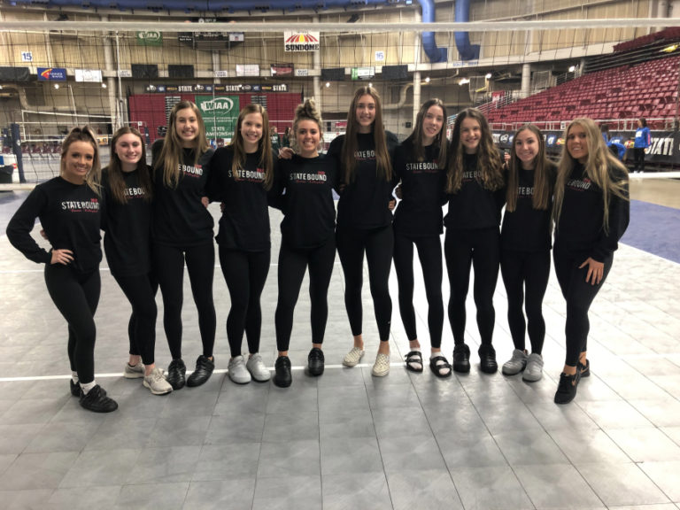 Contributed photo courtesy Michelle Ford 
 The Camas volleyball team celebrates a gritty state tournament performance that ended with a seventh place trophy at the Yakima Sundome on Nov. 23.