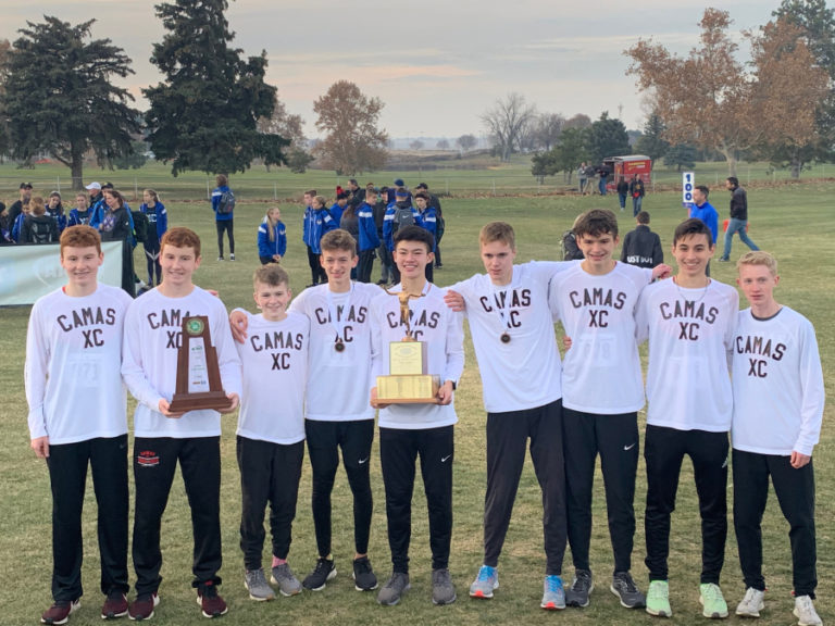 Submitted photo courtesy of Matt Legrand 
 The Camas High School boys cross country team hoists the team&#039;s first team state championship trophy on Nov. 9 in Pasco.
