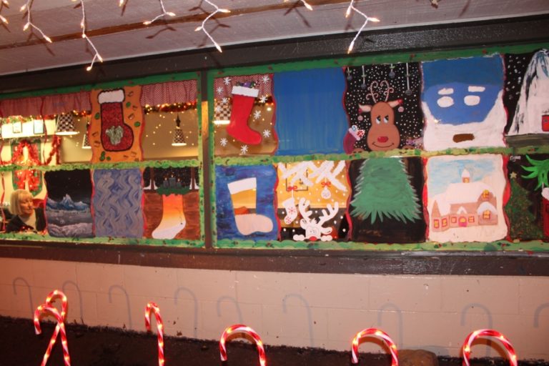 Every winter, employees at Camas&#039; Top Burger Drive In paint a stocking on a window of the resutarant. &quot;For our Christmas party we have a stocking contest,&quot; manager Jasmine Hannigan said.