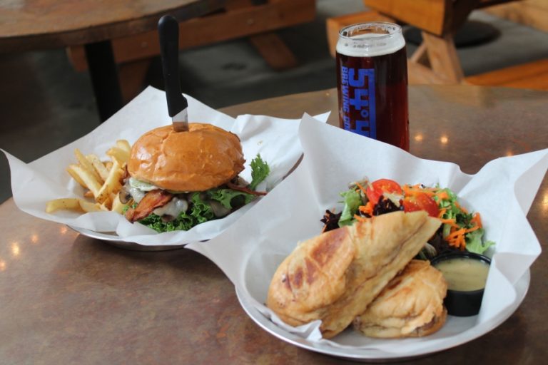 54-40 Brewing Company serves a variety of sandwiches, including the Fun Guy Burger (left) and cubano. At right: The Washougal brewery&#039;s pub features a fireplace that is especially popular during the winter months.