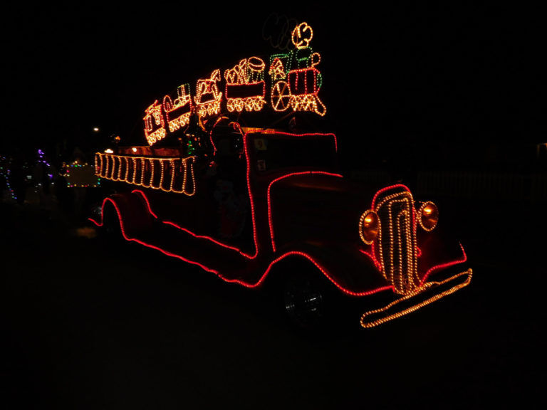 A vehicle decorated with lights takes part in the 2018 Lighted Christmas Parade, presented by the city of Washougal and the Downtown Washougal Association.