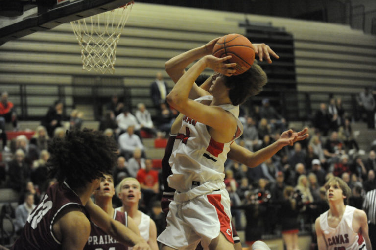 Camas High School junior Blake Bell drives to the basket against Prairie High School in the Papermakers&#039; home opener on Dec. 5.