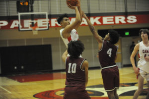 Camas High School junior Armand Nunez takes a shot in the Papermakers' home opener on Dec. 5. Nunez is expected to take on a significant scoring role this season. (Wayne Havrelly/Post-Record)