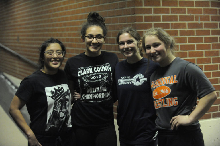 Washougal High School wrestlers Josylyn Ortiz (left), Malina Aguilar, Aleksi Donahue and Lacey Klopman (right) say wrestling has taught them how to overcome obstacles with their minds, not just strength.