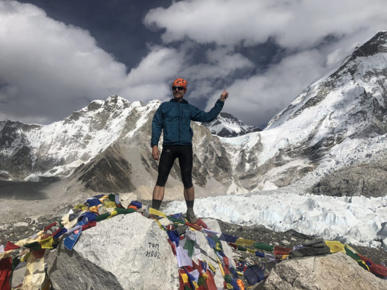 Camas resident Scott Loughney celebrates getting to the halfway point of his 400-mile mountain run at the base camp of Mount Everest.