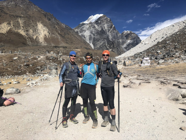 From left to right, the running team of Scott Loughney, Uprendra Sunawar and Ryan Wagner enjoy a beautiful day at the Mount Everest base camp.