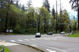 (Post-Record file photo) Drivers move through an increasingly busy intersection at Northeast Lake Road and Northeast Everett Street in Camas. City leaders say the intersection "is at or near failure" and must be redesigned to accommodate traffic and make the area safer for pedestrians and bicyclists. Work on the new roundabout was expected to begin this week, but has been halted amid the COVID-19 crisis. 