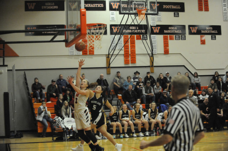 Washougal senior Jakob Davis makes a strong move in the post, scoring two of his 18 points during the Panthers&#039; win over Hockinson on Jan. 13.