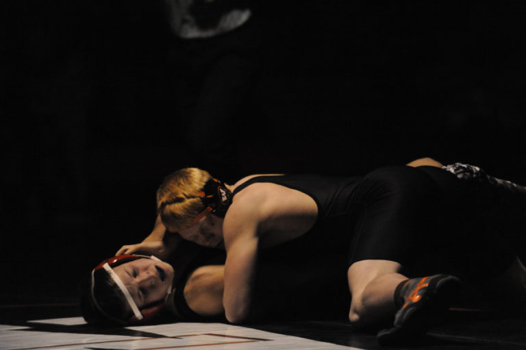 Washougal 160-pounder Scott Lees presses his opponent from R.A. Long for a first-round pin on Jan. 8 in Washougal.