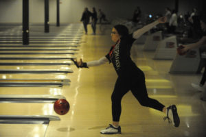 Camas senior Kimmy Boone displays her bowling form in a match against Union on Jan. 15 at Big Al's in Vancouver. (Wayne Havrelly/Post-Record)