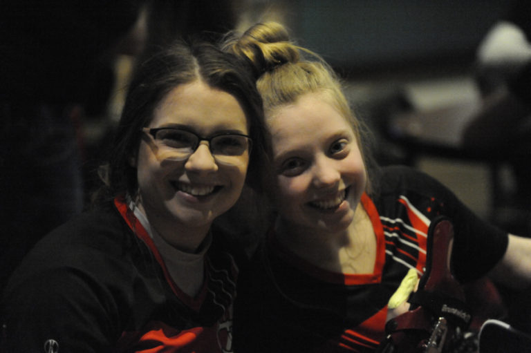 Senior twins Kimmy Boone (left) and Izzy Boone (right) both started bowling for Camas High School as freshmen after watching their parents compete in local bowling leagues.