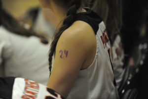 As a tribute to basketball legend Kobe Bryant, every Washougal girls basketball player player wrote '24' on their shoulders for their game gainst Ridgefield on Jan. 27, one day after Bryant died in a helicopter crash with his daughter and seven other people. (Wayne Havrelly/Post-Record)