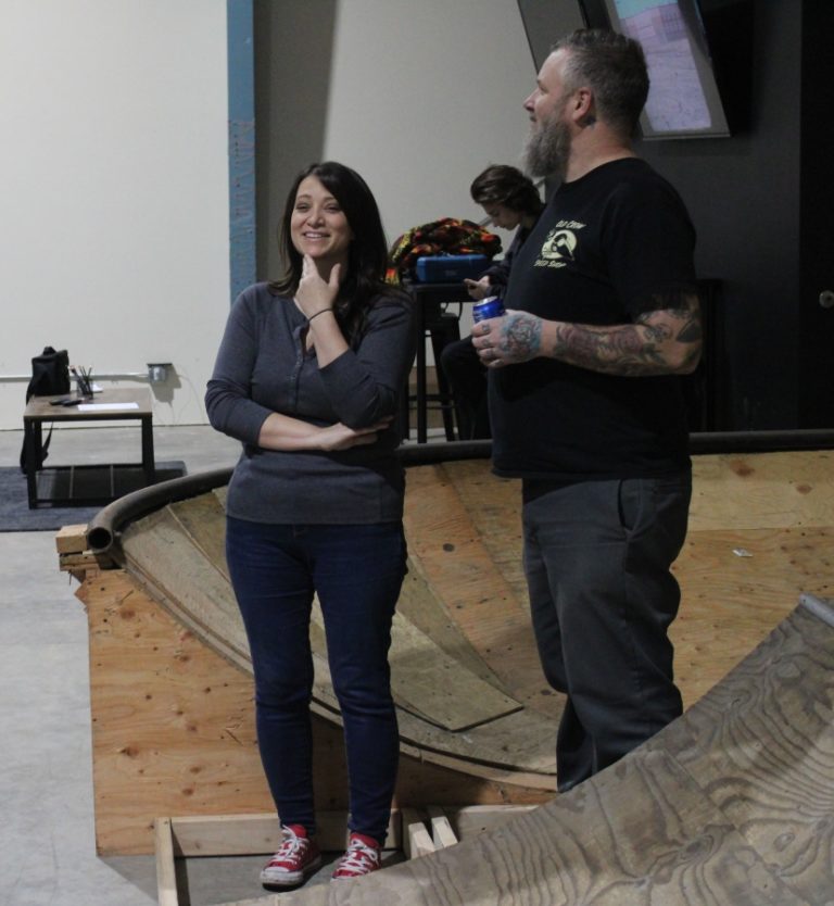 Lunchmoney Indoor Skate Park owners Rochelle Ramos (left) and John Henriksen watch skateboarders and scooter users utilize a half-pipe ramp at Lunchmoney Indoor Skate Park in Washougal on Jan.