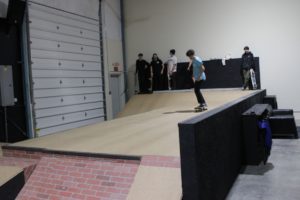 Skaters and scooter users ride a half-pipe ramp at Lunchmoney Indoor Skate Park in Washougal on Jan. 23, 2020. (Doug Flanagan/Post-Record)