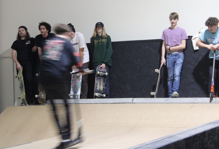 A group of skateboaders and scooter users utilize a half-pipe ramp at Lunchmoney Indoor Skate Park in Washougal on Jan.