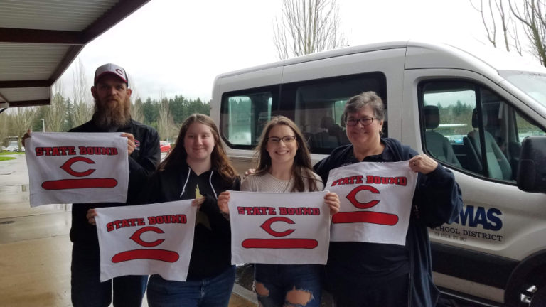 Camas bowlers show their Papermaker pride at a state tournament on Feb. 7. Pictured from left to right: assistant coach Joe Voogt, Kaeli Daniels, Kimmy Boone and coach Barb Burden.