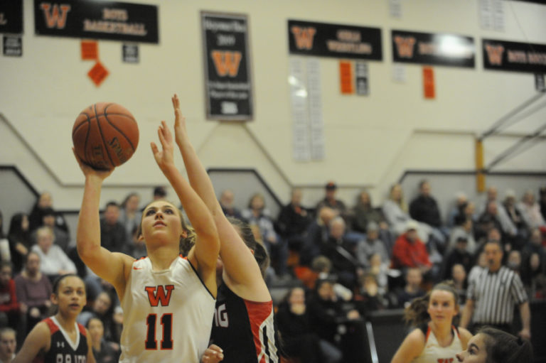 Washougal senior McKinley Stotts scores the first bucket of the game against R.A. Long in the final game of the regular season at Washougal High School on Feb.