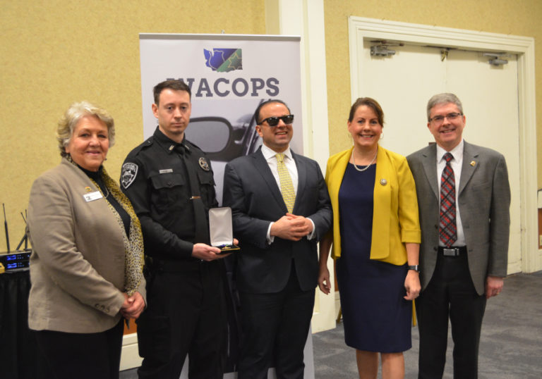 From left, Washougal mayor Molly Coston, Washougal police officer Francis Reagan, Washington lieutenant governor Cyrus Habib, Sen. Ann Rivers (R-La Center) and Washougal city manager David Scott pose for a photograph during an awards ceremony in Olympia on Feb. 12, when Reagan was named 2019 Officer of the Year by the Washington Council of Police &amp; Sheriffs.