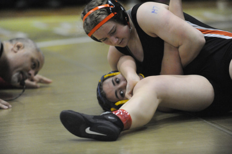 Washougal&#039;s Ashley Garrison goes after a pin at the Region 3 girls wrestling tournament in Kelso on Feb. 15. Garrison qualified for the Mat Classic XXXII, to be held on Feb. 21-22 in Tacoma.