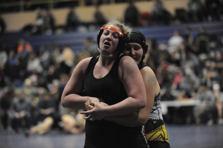 Washougal&#039;s Vanessa Brooks fights out of a hold at the Region 3 girls wrestling tournament in Kelso, Wash., on Feb. 15. Brooks qualified for Mat Classic in her first year of wrestling.