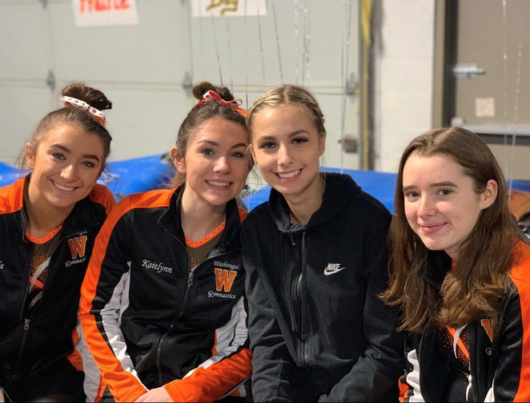 Two of Washougal&#039;s four gymnasts are heading to the 1A/2A/3A state meet. Senior Shaela Ausmus (left) won the school&#039;s first ever all-around title at a district meet, and Katie Stevens (second from left) qualified in three individual events. Also pictured, teammates Paris Krecklow and Brittney Meyer.