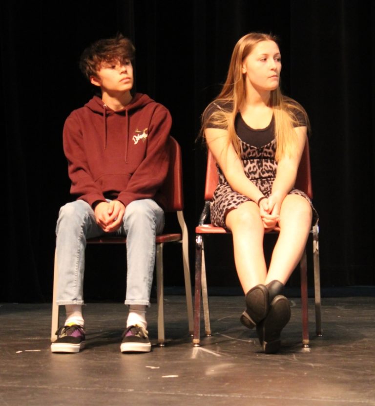 Washougal High School drama students Luke Flock (left) and Taylor Poulsen react during a rehearsal session for the school's upcoming production of "Things Fall (Meanwhile)" on Feb. 24.