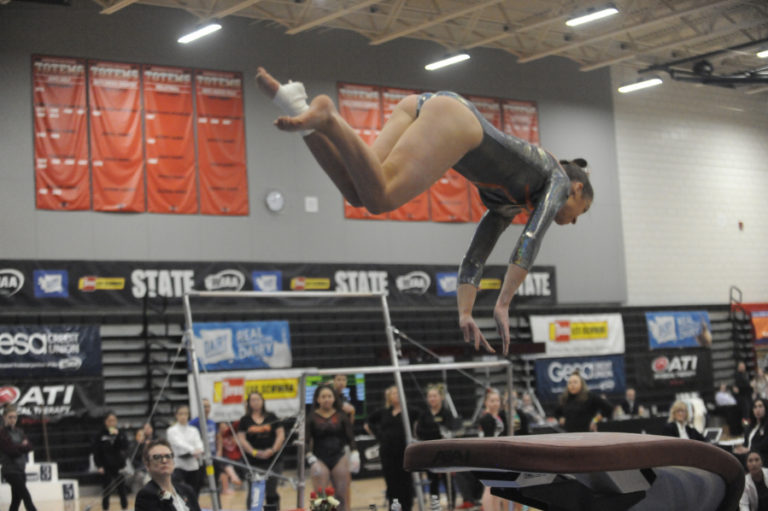 Washougal&#039;s Shaela Ausmus catapults off the vault at the 1A/2A/3A state gymnastics championships at Lake Sammamish High School on Feb. 21.