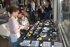 (Photo courtesy of Rene Carroll, Washougal School District) Visitors to the 2019 student art gallery in downtown Washougal browse artwork created by local youth. This year's student art gallery opens tonight, from 5 to 7 p.m., and will run Thursday through Saturday, March 5-7.