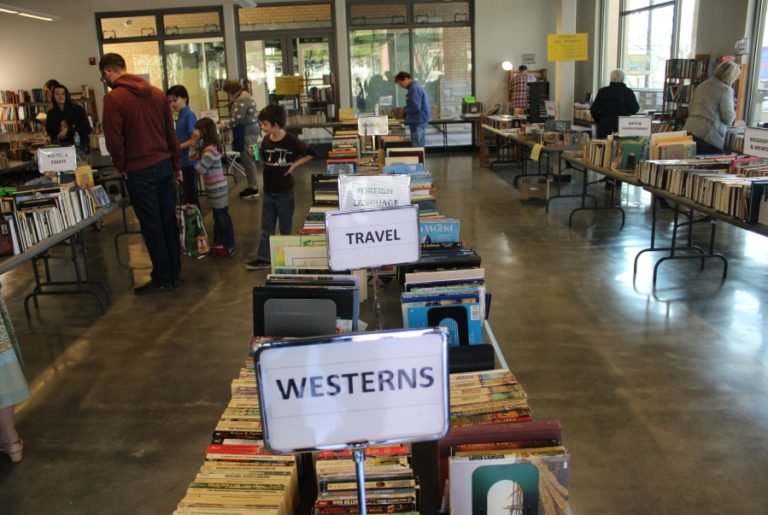 People browse through the aisles during a book sale in downtown Washougal on Friday, Feb.