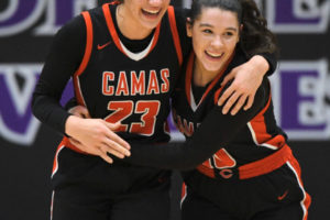 Camas Papermakers Jalena Carlisle (left) and Katelynn Forner (right) celebrate a playoff win over Skyview High at the 4A GSHL champions on  Feb. 18. The win propelled the Papermakers to the state tournament. (Contributed photo courtesy of Kris Cavin)