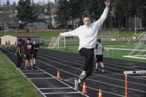 Washougal snior Gracie Dolan practices her take-off in the long jump at a recent practice session. (Photos by Wayne Havrelly/Post-Record)