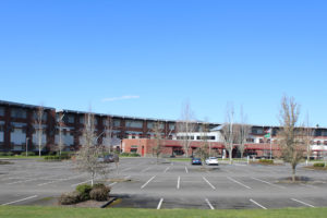 The parking lot at Camas High School is virtually empty on Monday, March 16, the first day of cancelled classes after Washington Governor Jay Inslee closed all public and private schools in the state until at least April 24 to combat the spread of COVID-19.