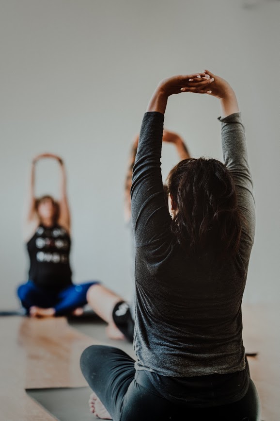 (Contributed photo by Aleya Burg courtesy of Body Bliss) Body Bliss yoga studio owner Jacquie Michelle (left) teaches a class in her downtown Camas yoga studio. The studio, along with other Washington state gyms and recreation facilities, has closed due to the COVID-19 pandemic, but plans to livestream classes for members and the community.