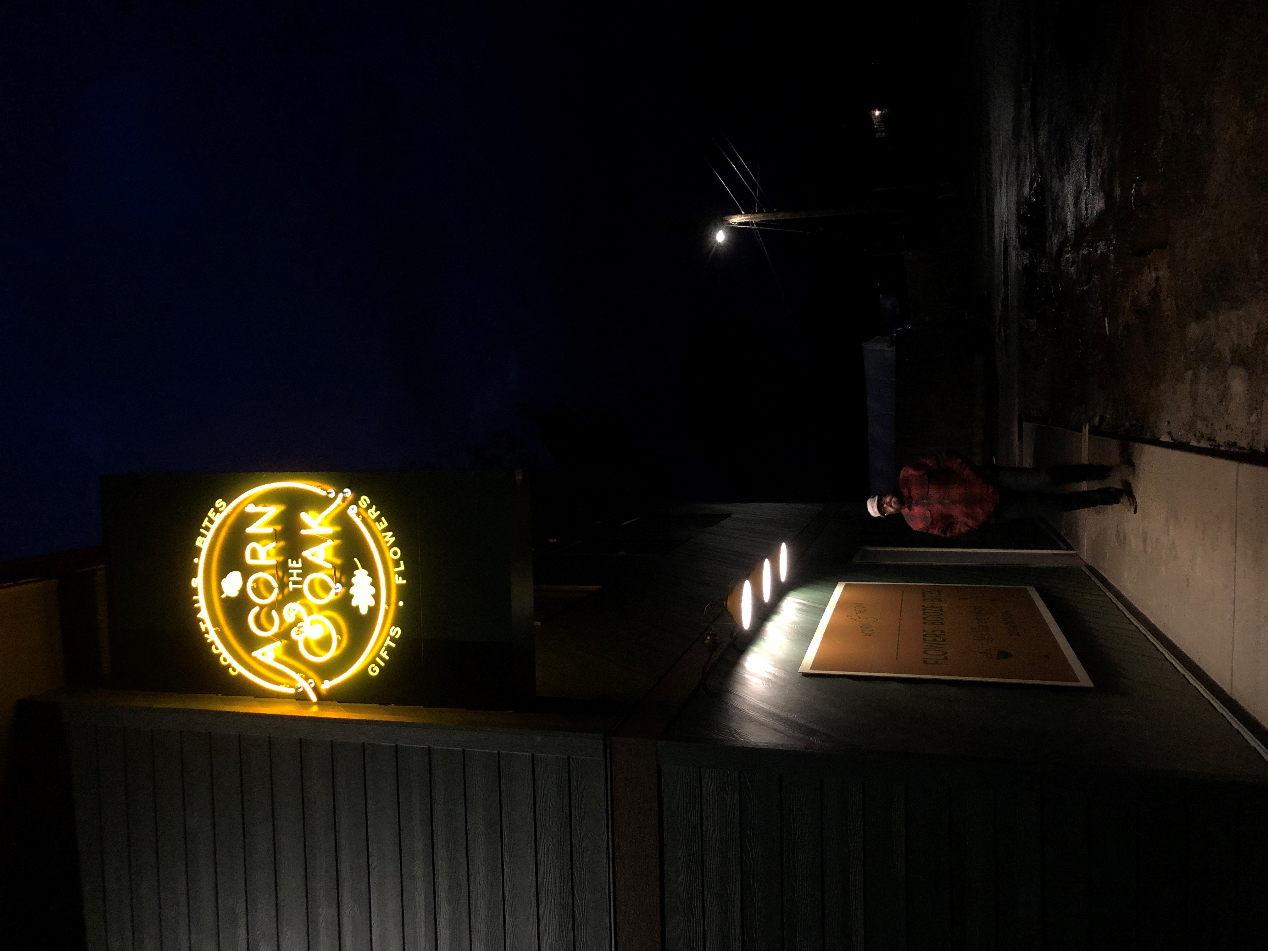 (Photo courtesy of Janessa Stoltz) 
Chuck Stoltz, co-owner of Acorn & the Oak, stands under the business' sign at 3533 N.E. Everett St., in Camas. 