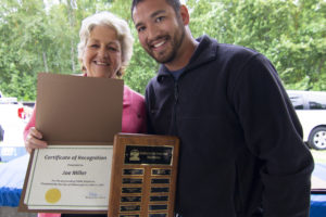 Joe Miller (right), the city of Washougal's wastewater treatment plant collections specialist, receives a certificate of recognition from Mayor Molly Coston. (Contributed photo courtesy of Joe Miller)