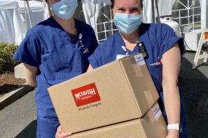 (Contributed photos courtesy of McTavish Shortbread)
Health care workers receive a shipment of McTavish Shortbread treats delivered by the Portland-based company's 