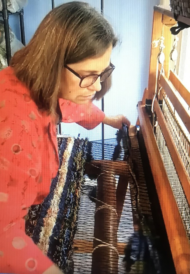 Kathy Marty, owner of the Washougal-based Windy Hills Weavers studio, weaves a rug in a video produced for the 2020 Washougal Studio Artists Tour, which moved to a virtual format due to the COVID-19 pandemic. Marty uses two vintage floor looms and Pendleton selvage to create handwoven rugs.