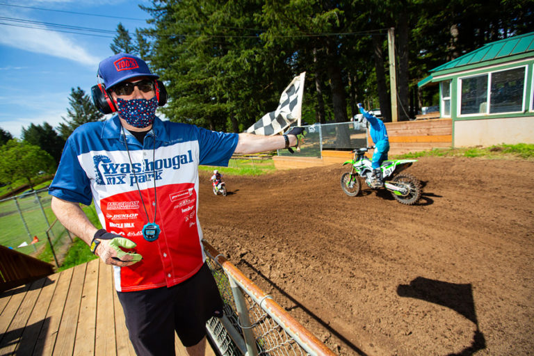 A motocross rider (right)  celebrates the end of a race during a &quot;recreational ride day&quot; event held May 8-9 at Washougal MX Park.