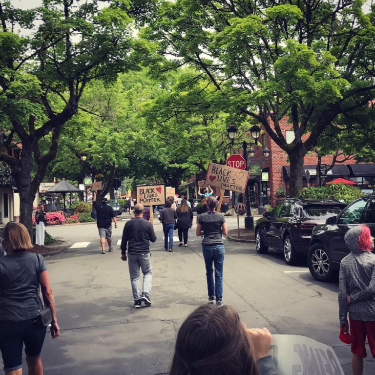 Peaceful protesters march through the streets of downtown Camas in support of the Black Lives Matter movement on Friday, June 5.
