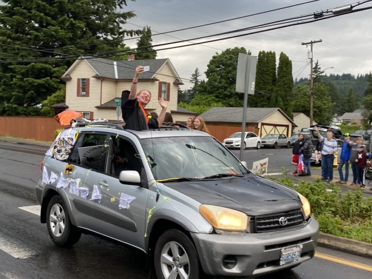 Washougal High School seniors celebrate while driving down Main Street in downtown Washougal on Friday, June 5, as part of the school&#039;s &quot;Senior Car Parade and Sunset Viewing&quot; event, which preceded a virtual graduation ceremony on Saturday, June 6.