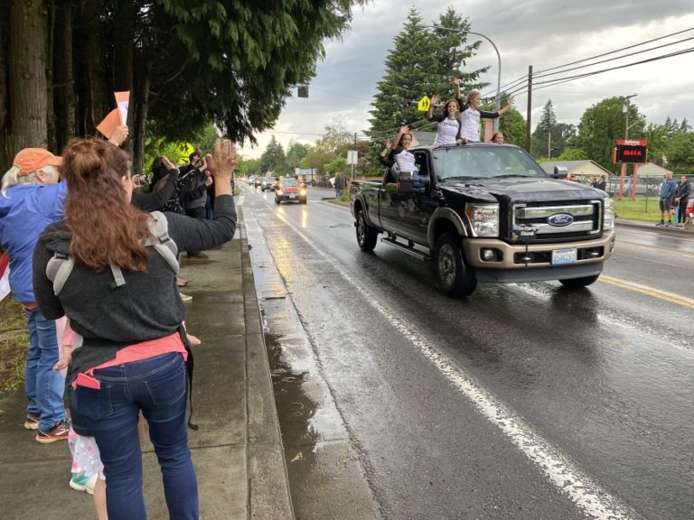 Washougal High School seniors celebrate while driving down Main Street in downtown Washougal on Friday, June 5, as part of the school&#039;s &quot;Senior Car Parade and Sunset Viewing&quot; event, which preceded a virtual graduation ceremony the next day.