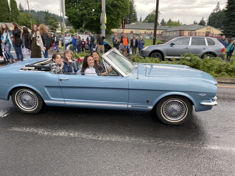 Washougal High School seniors celebrate while driving down Main Street in downtown Washougal on Friday, June 5, as part of the school&#039;s &quot;Senior Car Parade and Sunset Viewing&quot; event, which preceded a virtual graduation ceremony on June 6.