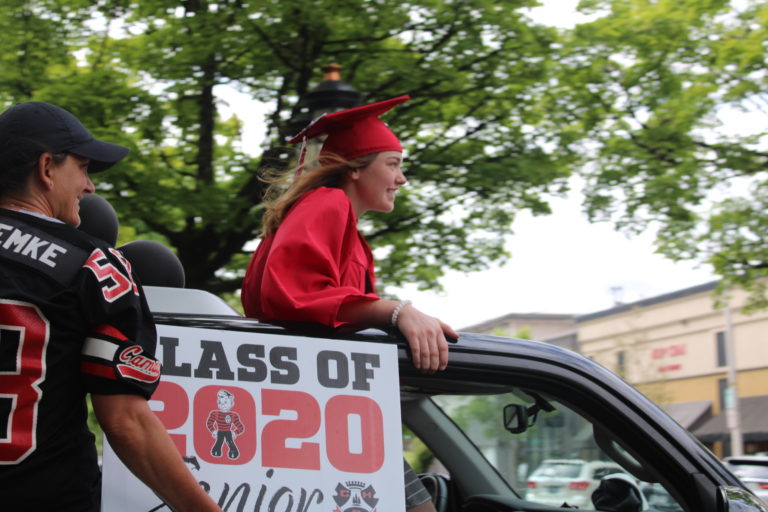 (Photos by Kelly Moyer/Post-Record) Camas High School Class of 2020 graduates and their families cruise through downtown Camas on Saturday, June 27, in a parade honoring the CHS grads. The car parade culminated outside Camas High School, where the recent graduates picked up their diplomas and yearbooks at a drive-through event meant to slow the spread of COVID-19. 