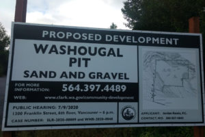 A sign shows the original date, July 9, of the public hearing for the Washougal Pit's permit application. That hearing has been postponed, but public comments are due Thursday, July 16. (Contributed photos courtesy of Rachel Grice)