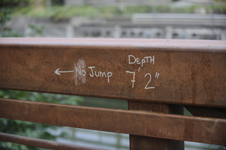 Post-Record file photo 
 A depth of 7 feet, 2 inches, with a &quot;no jump&quot; warning, is recorded on the Lacamas Park Trail pedestrian bridge in August 2019. (Post-Record file photo)