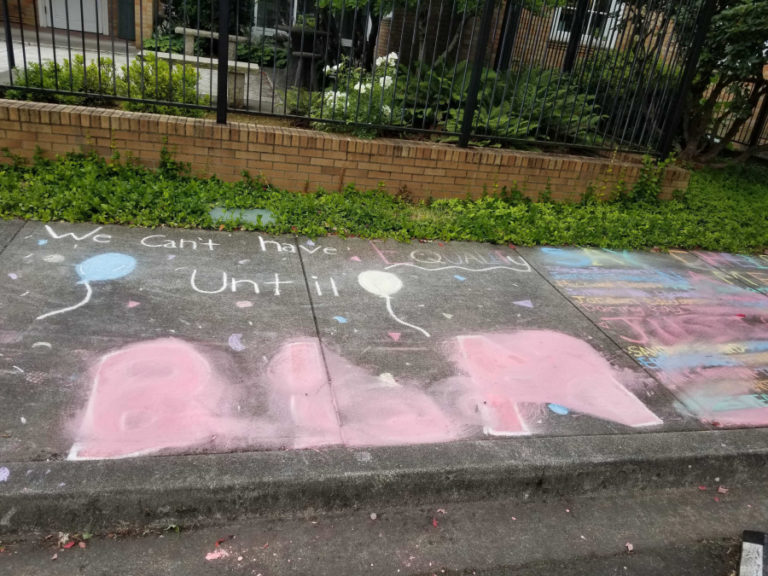 "Before and after" photos show the damage done to public artwork outside the Camas library in July, after someone smudged out all signs of Black Lives Matter.