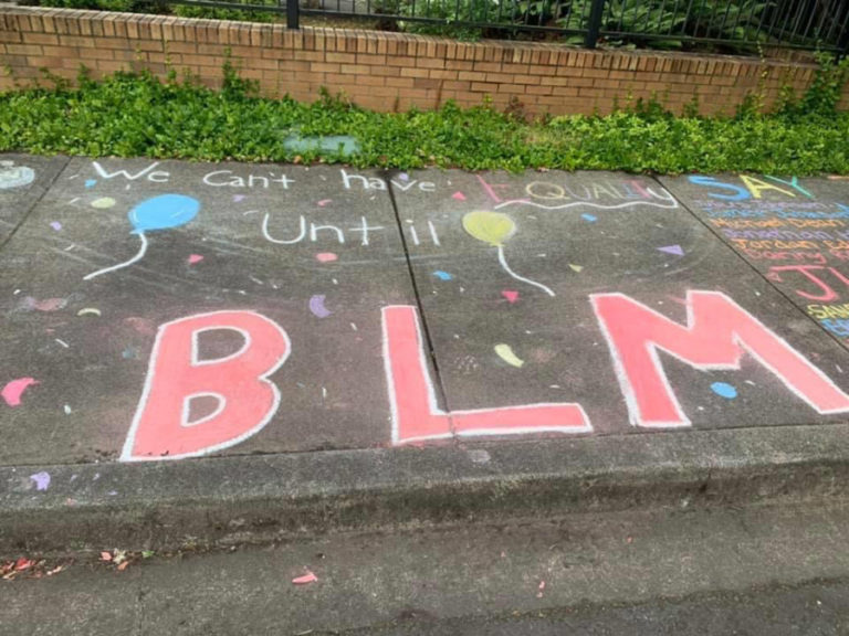 "Before and after" photos show the damage done to public artwork outside the Camas library in July, after someone smudged out all signs of Black Lives Matter.